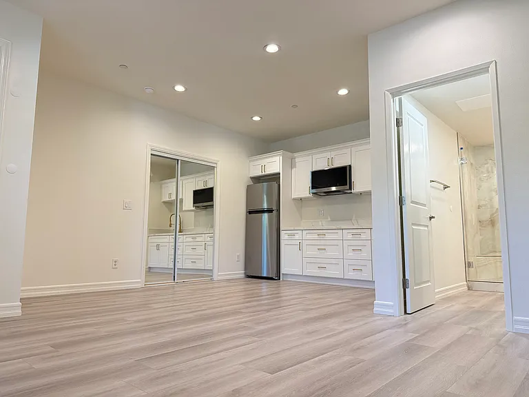 Spacious open-concept living area with abundant natural light