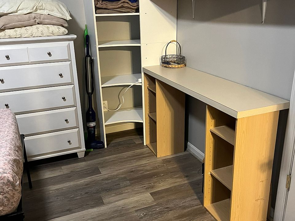 Computer desk and storage in bedroom