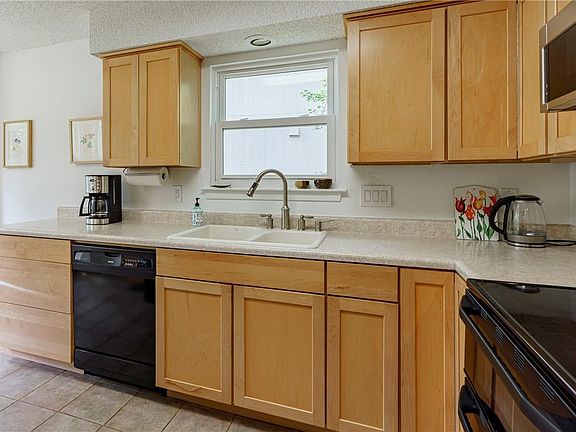 Kitchen countertops will be replaced in April 2026. Hardwood floors were installed in 2025.
