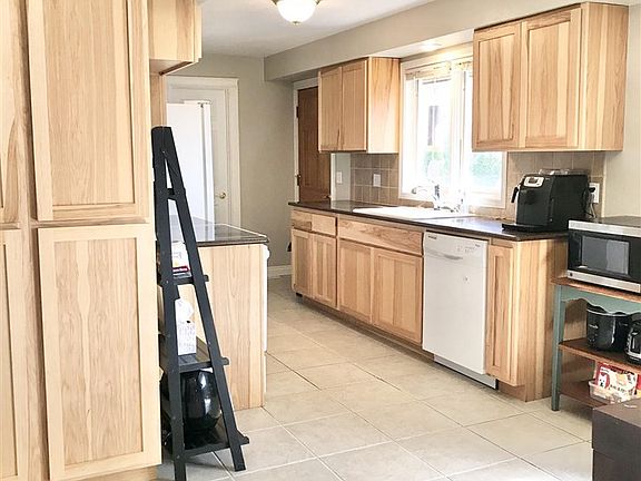 4th image of 10806 E 22nd Ave