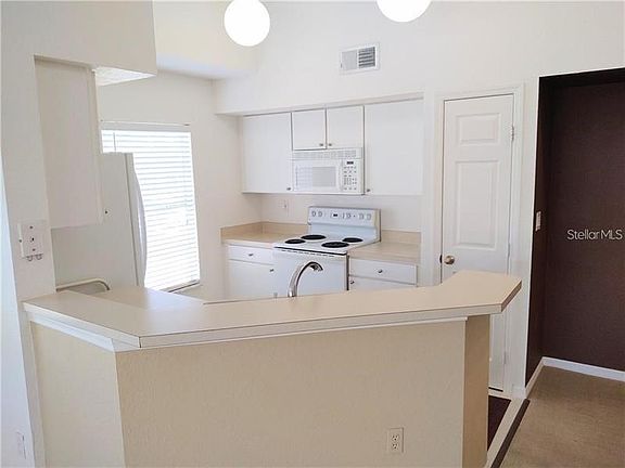 4th image of 9012 Lake Chase Island Way #9012