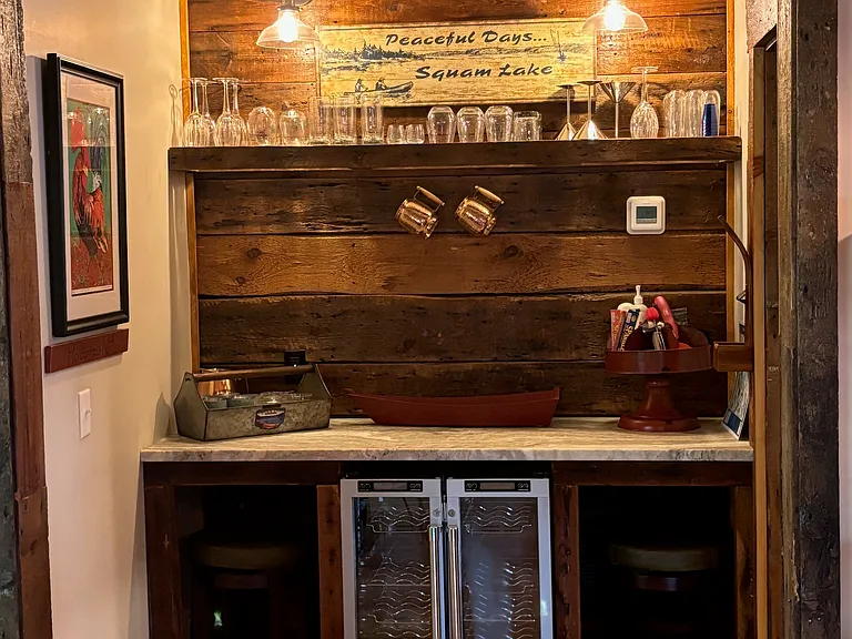 custom bar area and walk in pantry to the right