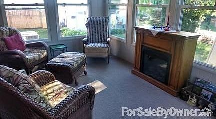 Sun Room
						:
						lots of light and a terrific view to the lovely yard! Could even be an office!