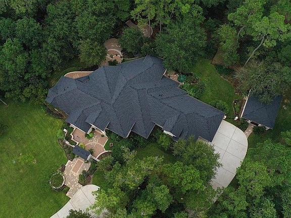 This sprawling 1 story home has 4 bedrooms, 3.5 baths, Wine Cellar plus 3 car garage plus a Guest house that is being used as shop/ Man Cave!