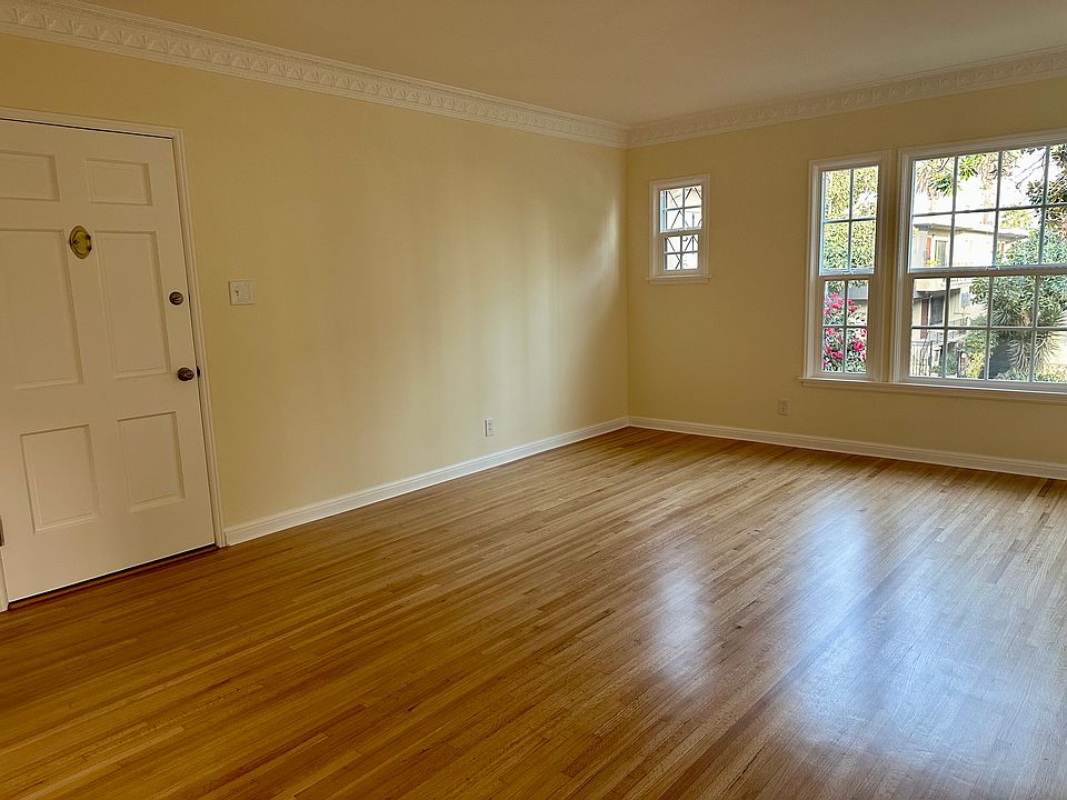 Living area - 3rd view - very spacious, beautiful hardwood floors, windows