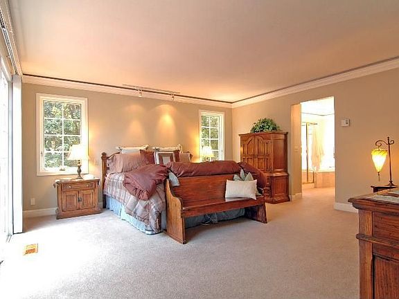 Ensuite Master bedroom with walk in closet and zoned heating