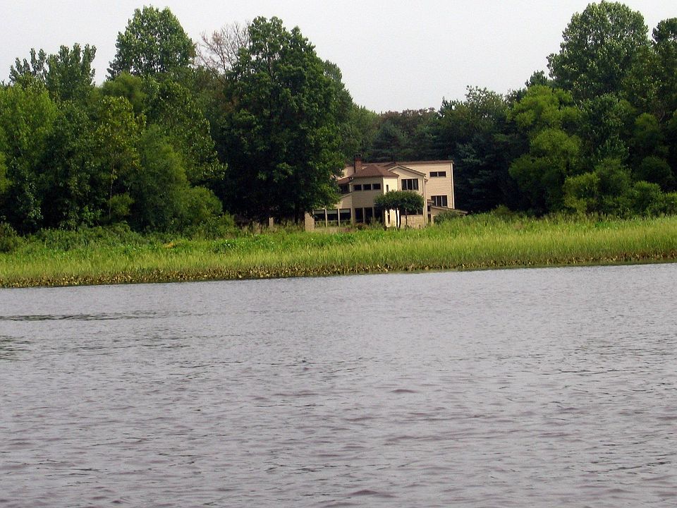 VIEW OF HOUSE FROM CREEK