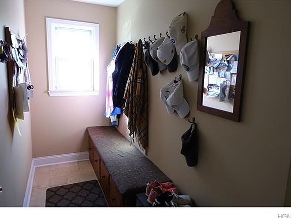 Mudroom off 2 car garage entry is perfect for shoe, coat and hat removal before entering.
