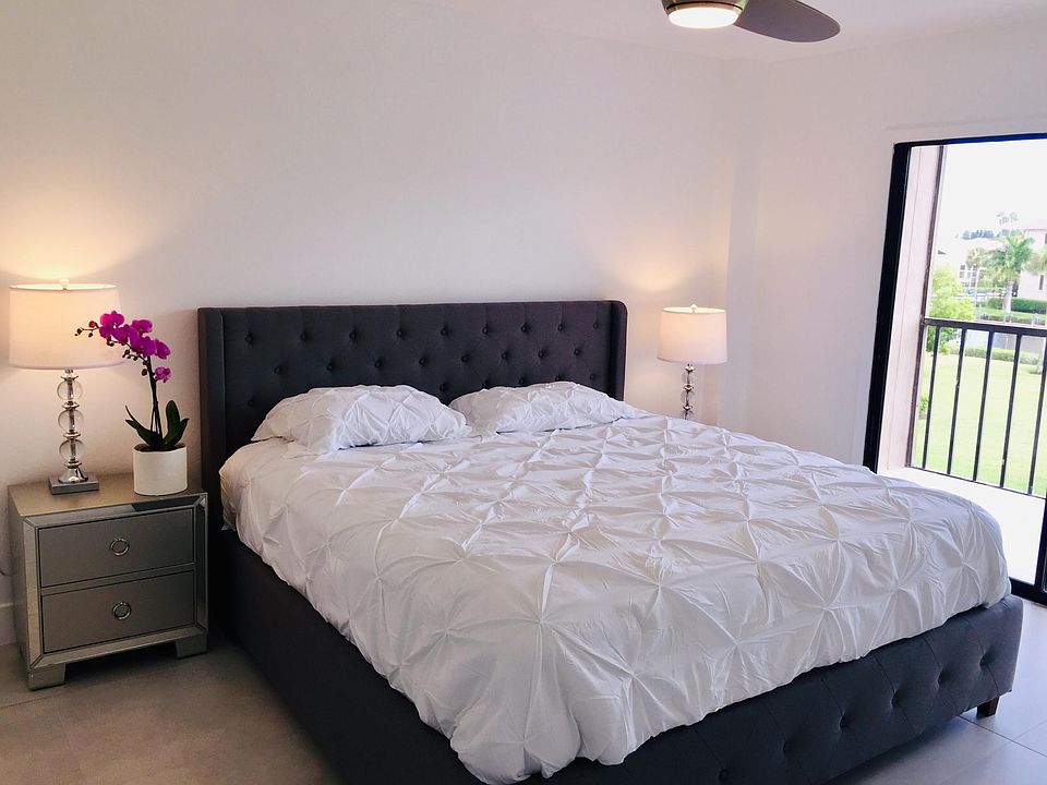KING BED IN MASTER BEDROOM.