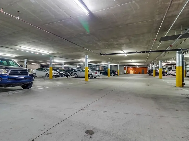 Underground secured parking, 2 car spots
