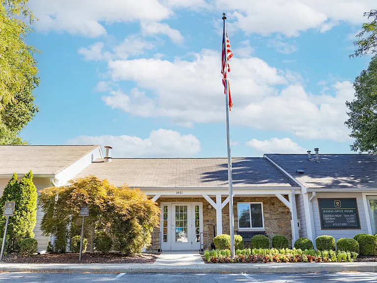 Clubhouse Exterior at Woodbridge of Bloomington Apartments