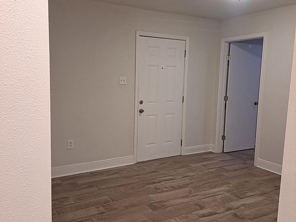 Living room and front door entry