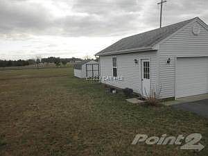 GARAGE AND SHED IN BACK