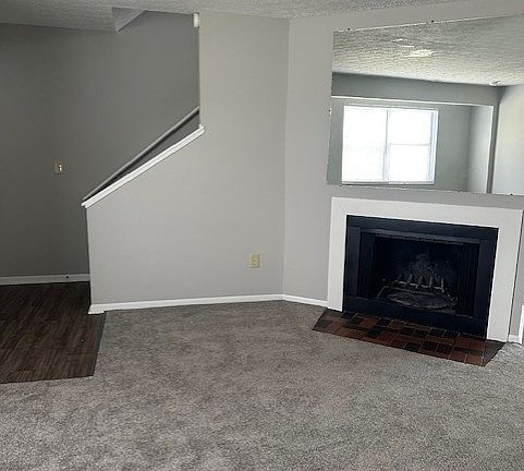 Living room- new carpet, paint and vinyl