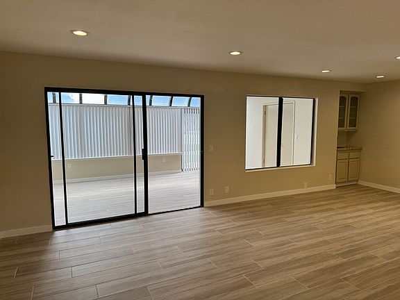 Living room with sun room
