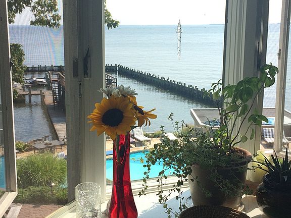 kitchen view of pool and bay