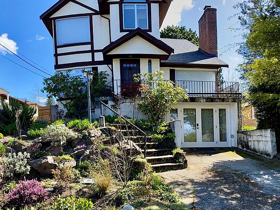 Front of house in beautiful, quiet neighborhood. Rock garden blooms from spring well into fall. Plenty of street parking in addition to driveway.