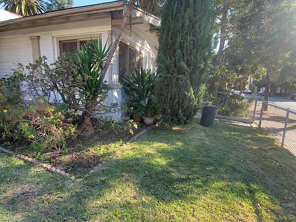 front yard corner Lucretia Av/EPK Av
