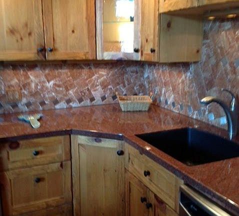 kitchen with sink and corner upper glass storage/display cabinet