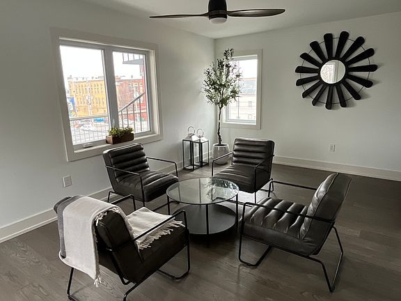 Loft, has wet bar with beverage fridge and access to attached balcony