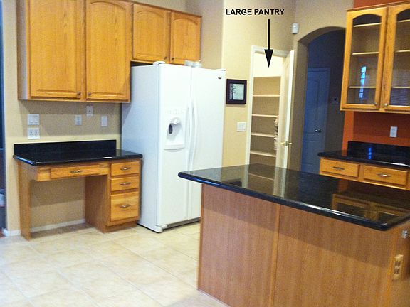 Side by side fridge included