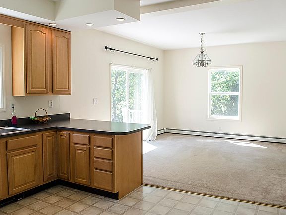 Dining rm, adjacent to living room; viewed from kitchen