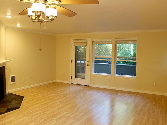 Living room opens onto cozy deck.
