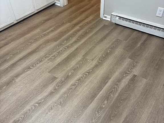 New flooring installed in kitchen & bedroom 11/25
