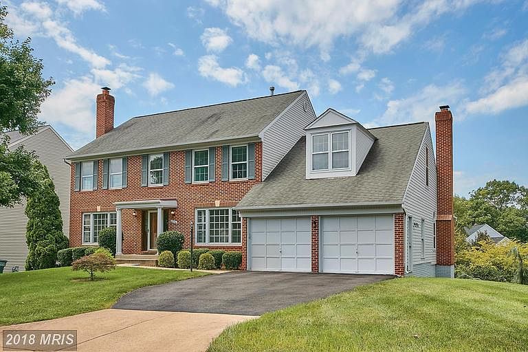 Beautiful brick front colonial with two car garage