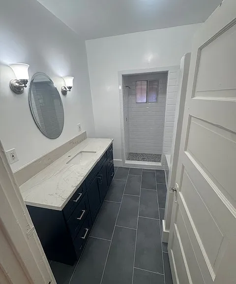 Full bathroom with shower and separate tub