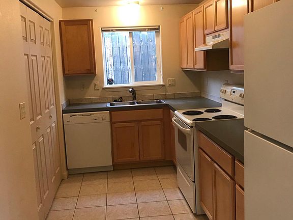 Kitchen. Good storage, fridge, electric range and dishwasher.