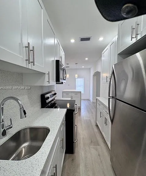 4783 NW Flagler Ter — Photo 7