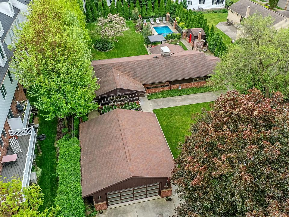 two car garage, concrete walkway around the entire house