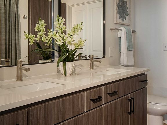 Remodeled bathrooms with luxury vinyl plank flooring
