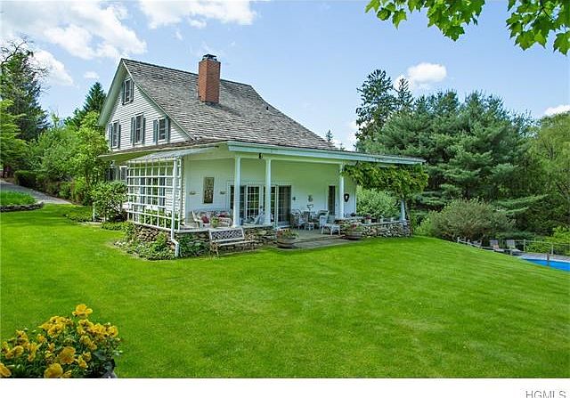 Apple Ridge Farm on Prestigious Quaker Hill, late 1800's updated charming farm house on 9.49 acres.U