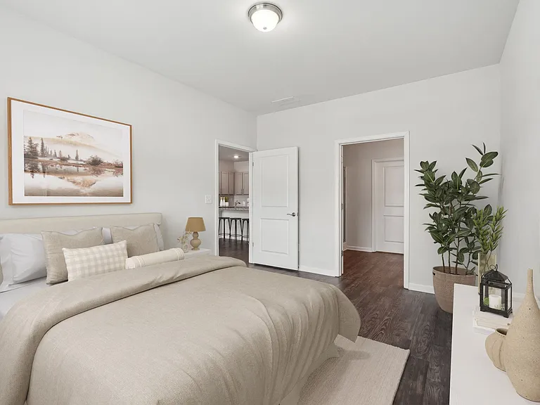 Spacious primary bedroom with a king bed.