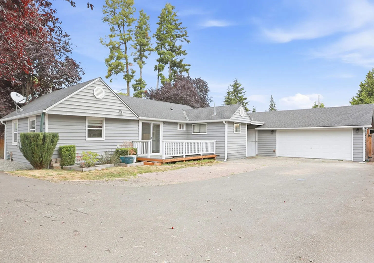 Updated Rambler with covered patio and large detached garage. — Photo 1