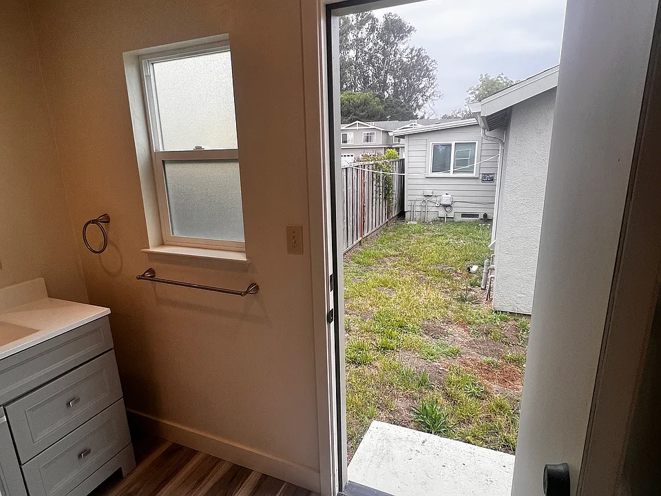 Exterior doorway at side of unit