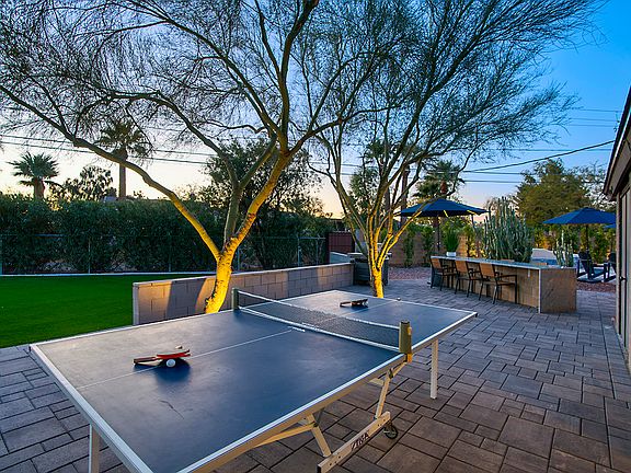 Back patio area with ping pong and seating