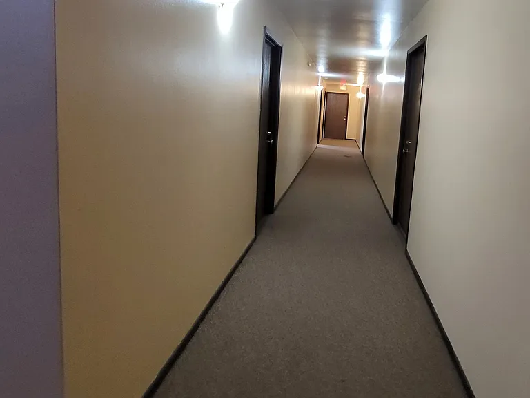 2nd floor hallway. The laundry room is at the end of the hallway