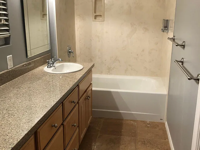 Full bath attached to upstairs bedroom