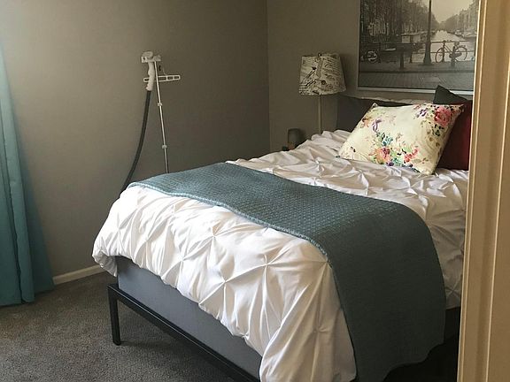 bedroom with 2 closets