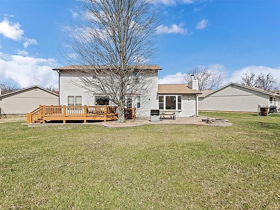 Spacious Backyard, includes deck, patio, fire pit, and shed for extra storage.