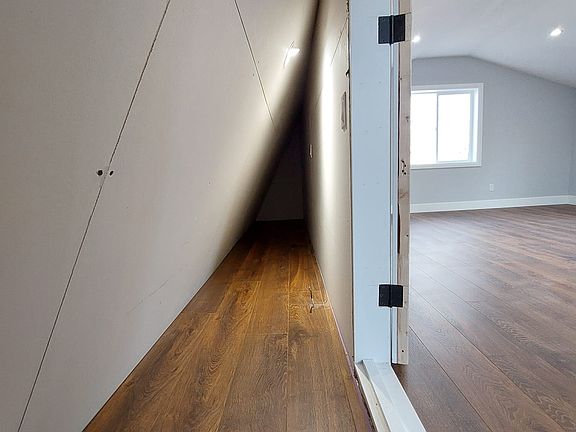 Tons of upstairs storage. Runs along both sides of the top floor.