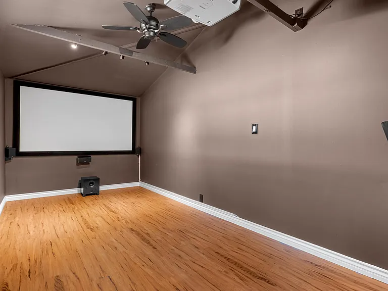 Bonus room with projector, screen and surround sound.