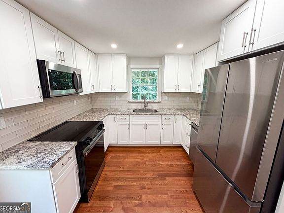 2nd image of 2320 Capehart Cir NE