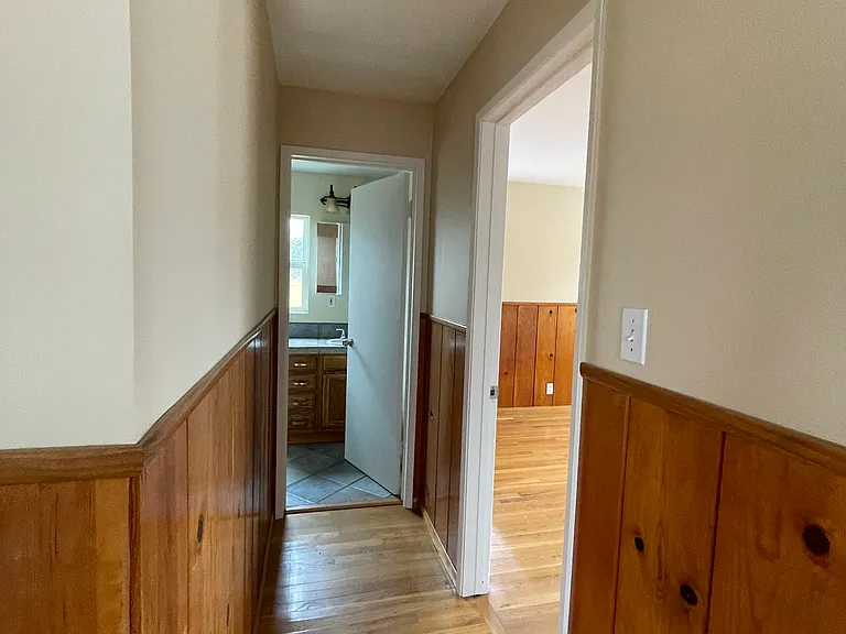 Hallway from dining area leading to the 2nd bedroom and bathroom