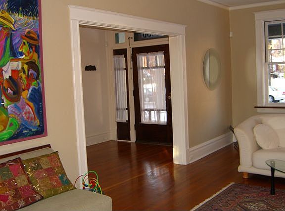 Living rooom opens to 30 ft hallway