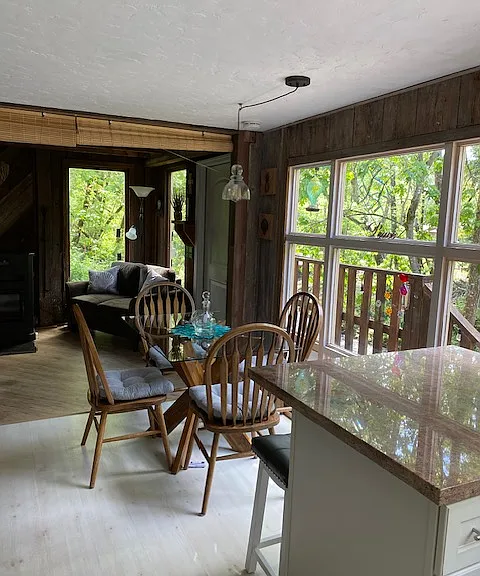kitchen table adjacent to TV room
