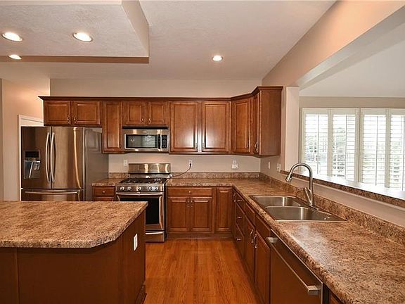 Kitchen  open to sun filled morning room